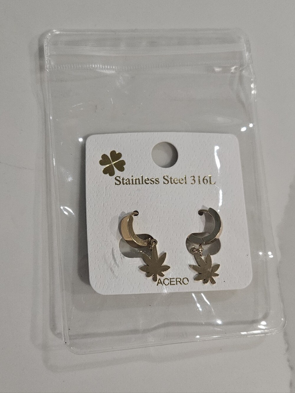 Gold-tone Stainless Steel Hoop Earrings with Leaf Charms